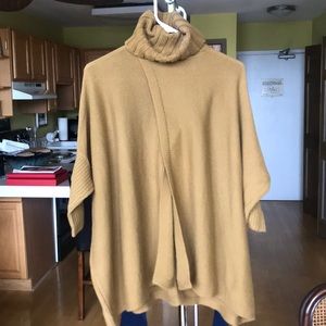 DVF olive turtleneck w/ slot detail